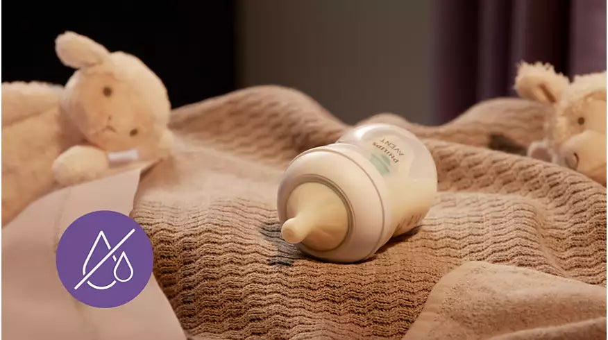 رضاعه ١٢٥مل ناتشورال مع الملعقة الخضراء لمنع المغص Avent