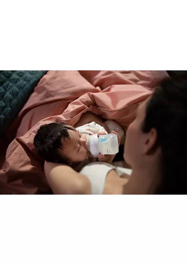 رضاعه ١٢٥مل ناتشورال مع الملعقة الخضراء لمنع المغص Avent